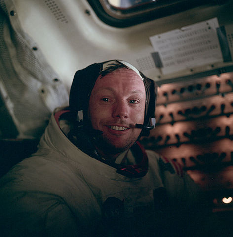 Picture of a smiling Neil Armstrong in the lunar module Eagle